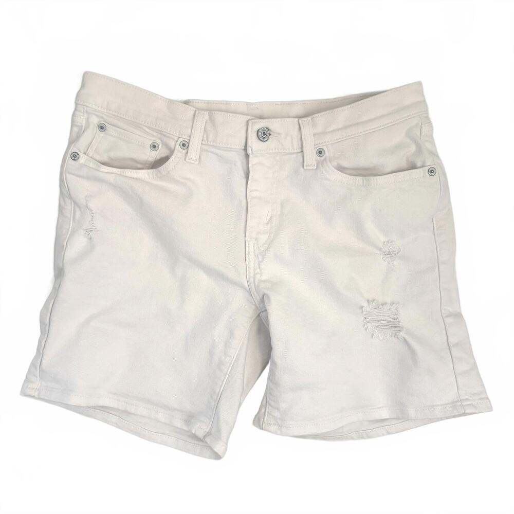 Levi’s | Women’s White Denim Jean Shorts Rips Size 29